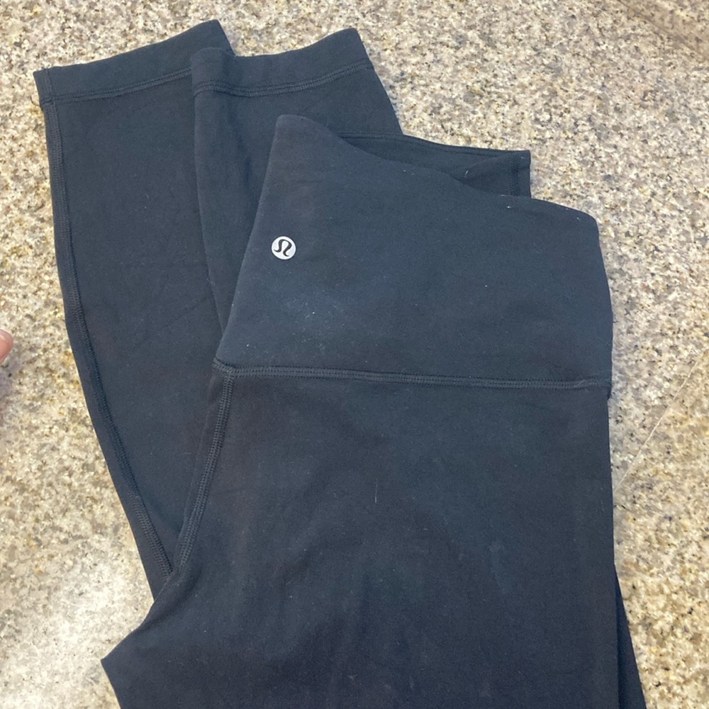 Lululemon cris cross front leggings black size 10 -one tiny pocket on the back